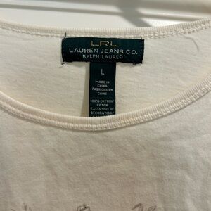 Ralph Lauren Women’s medium cream colored shirt. Good condition.